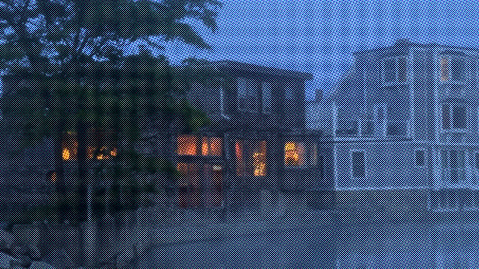 Island homes glowing at dusk